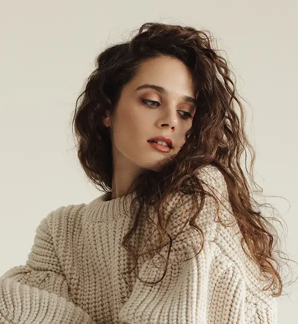 Female looking over her shoulder | Dr. Z Facial Plastic Surgery